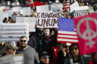 <p>Protestors participate in a Women’s March highlighting demands for equal rights and equality for women, Saturday, Jan. 20, 2018, in Cincinnati. Ohio. (Photo: John Minchillo/AP) </p>