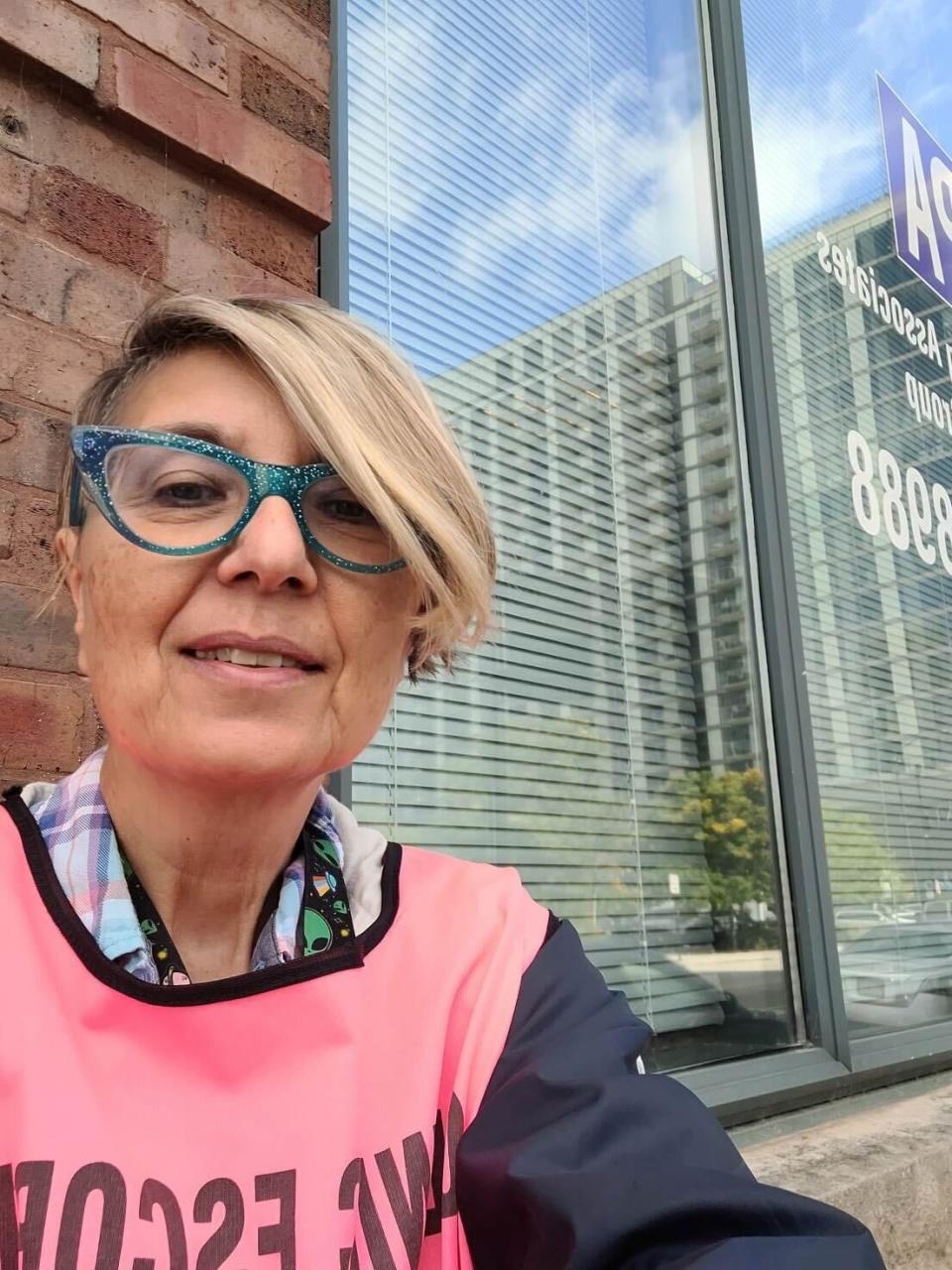 <div class="inline-image__caption"><p>Benita Ulisano outside the Chicago clinic.</p></div> <div class="inline-image__credit">Courtesy of Benita Ulisano </div>