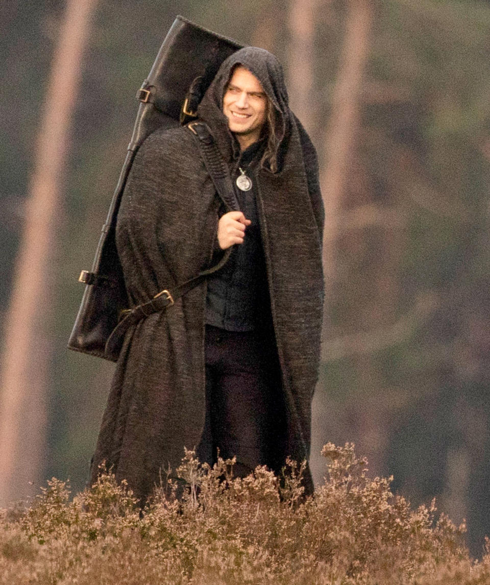 <p>Henry Cavill is seen in costume while filming the second season of <i>The Witcher</i> on Monday in Surrey, England. </p>