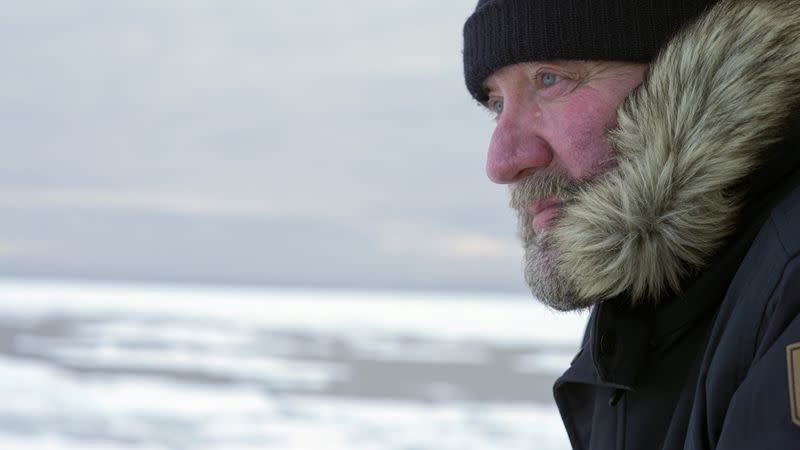 Ice navigator Paul Ruzycki of Canada looks on aboard the Greenpeace's "Arctic Sunrise" ship in the middle of the Arctic Ocean