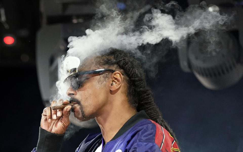 FILE - Snoop Dogg performs a DJ set as "DJ Snoopadelic" during the "Concerts In Your Car" series on Oct. 2, 2020, in Ventura, Calif. The rapper turns 50 on Oct. 20. (AP Photo/Chris Pizzello, File)