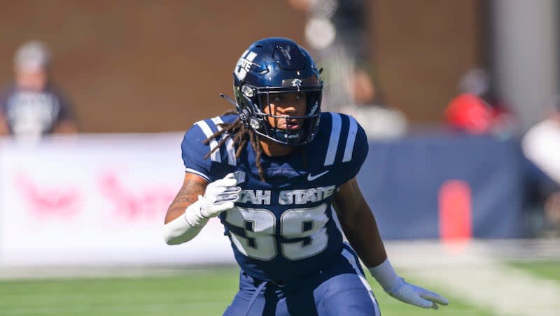 Utah State linebacker Jadon Pearson (39) runs to make the tackle during an NCAA football game on Saturday, Sept. 14, 2024 in Logan, Utah.