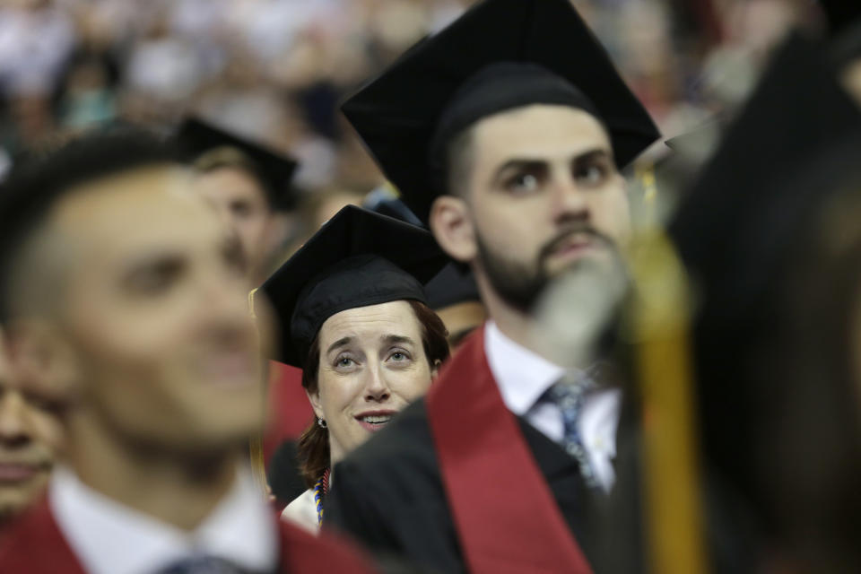 New graduates participate in an undergraduate commencement ceremony for Ramapo College in Newark, N.J., Thursday, May 10, 2018. (AP Photo/Seth Wenig)