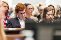 Buster Murdaugh, left, and his girlfriend Brooklynn White attend the double murder trial of his father, Alex Murdaugh, at the Colleton County Courthouse in Walterboro, S.C., on Monday, Feb. 6, 2023. (Jeff Blake/The State via AP, Pool)