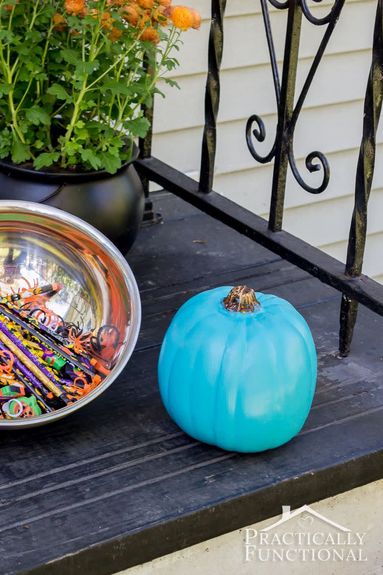 <p>The color teal may not be a common autumnal hue, but it's still pretty stunning on your front porch. Even better? <a href="http://www.foodallergy.org/teal-pumpkin-project#.VhfW2bRVhBd" rel="nofollow noopener" target="_blank" data-ylk="slk:The Teal Pumpkin Project;elm:context_link;itc:0;sec:content-canvas" class="link ">The Teal Pumpkin Project</a> has encouraged more than 100,000 households to let trick-or-treaters with a food allergy know they can <a href="http://www.goodhousekeeping.com/holidays/halloween-ideas/a25868/teal-pumpkin-project/" rel="nofollow noopener" target="_blank" data-ylk="slk:safely collect some goodies;elm:context_link;itc:0;sec:content-canvas" class="link ">safely collect some goodies</a> at your house. </p><p>Get the tutorial at <a href="http://www.practicallyfunctional.com/teal-pumpkin-project-halloween/#_a5y_p=2717596" rel="nofollow noopener" target="_blank" data-ylk="slk:Practically Functional;elm:context_link;itc:0;sec:content-canvas" class="link ">Practically Functional</a>.</p>