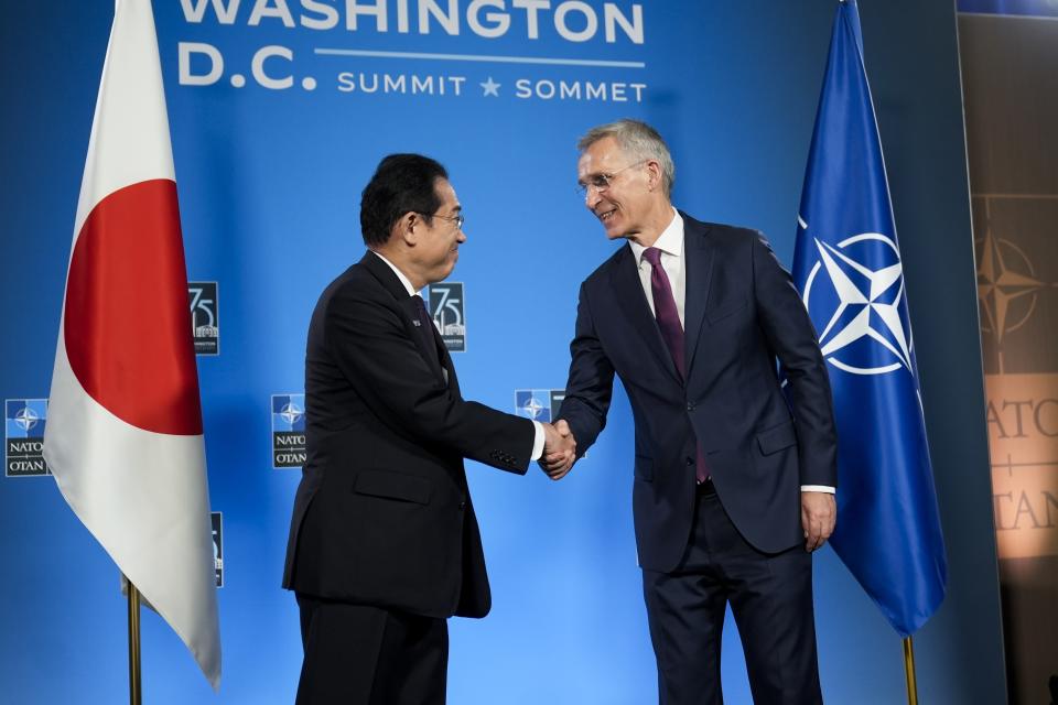 Japan's Prime Minister Fumio Kishida, left, meets with NATO Secretary General Jens Stoltenberg, right, Thursday, July 11, during the NATO summit in Washington. (AP Photo/Stephanie Scarbrough)