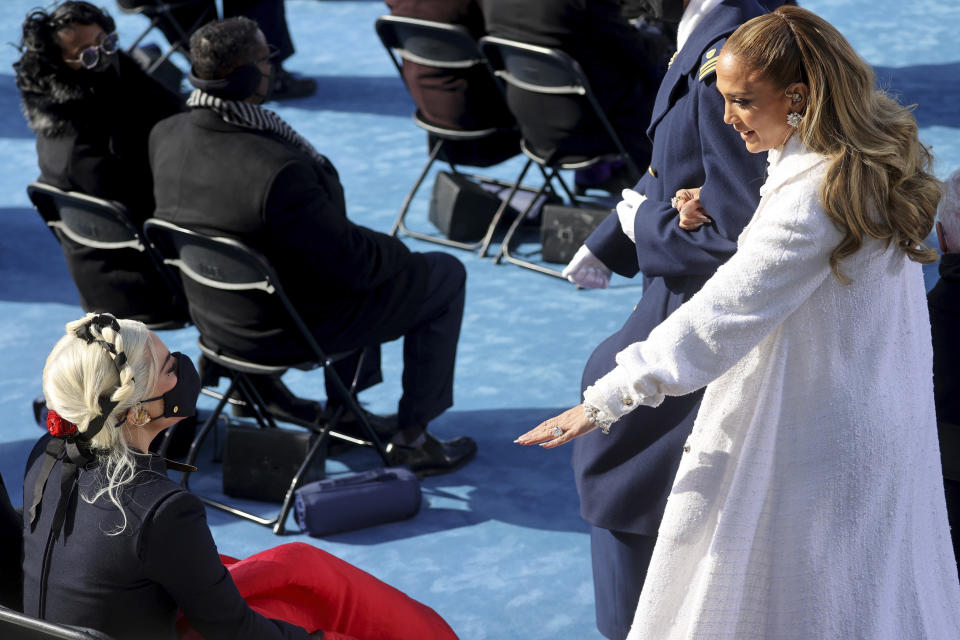 Singers Jennifer Lopez, right, and Lady Gaga greet after performing at President-elect Joe Biden’s inauguration, Wednesday, Jan. 20, 2021, at the U.S. Capitol in Washington. (Jonathan Ernst/Pool Photo via AP)