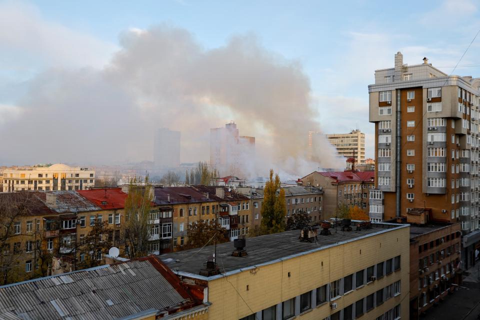 Smoke rises near the railway building this morning (Reuters)