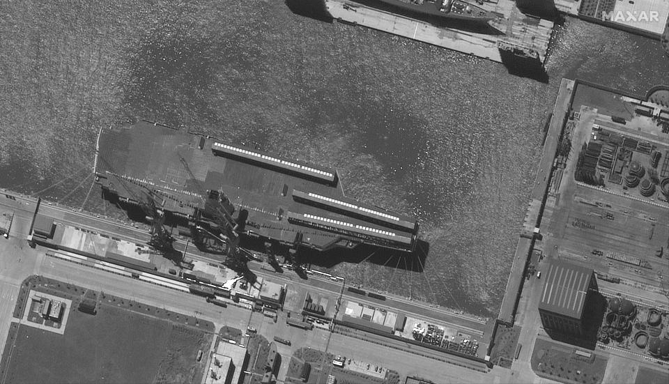 CHINESE AIRCRAFT CARRIER, JIANGNAN SHIPYARDS, CHINA, JUNE 18, 2022: Maxar satellite imagery close up view of CV 18 Fujian Aircraft Carrier, Shanghai, China.