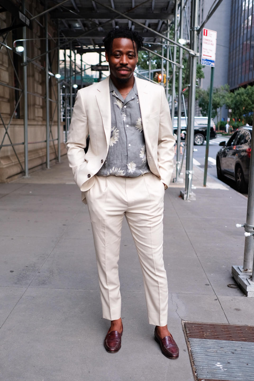 man wearing suit on street of new york