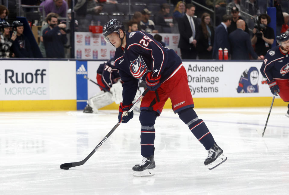 Columbus Blue Jackets forward Patrik Laine warms upf before an NHL hockey game against the Carolina Hurricanes in Columbus, Ohio, Thursday, Jan. 12, 2023. (AP Photo/Paul Vernon)