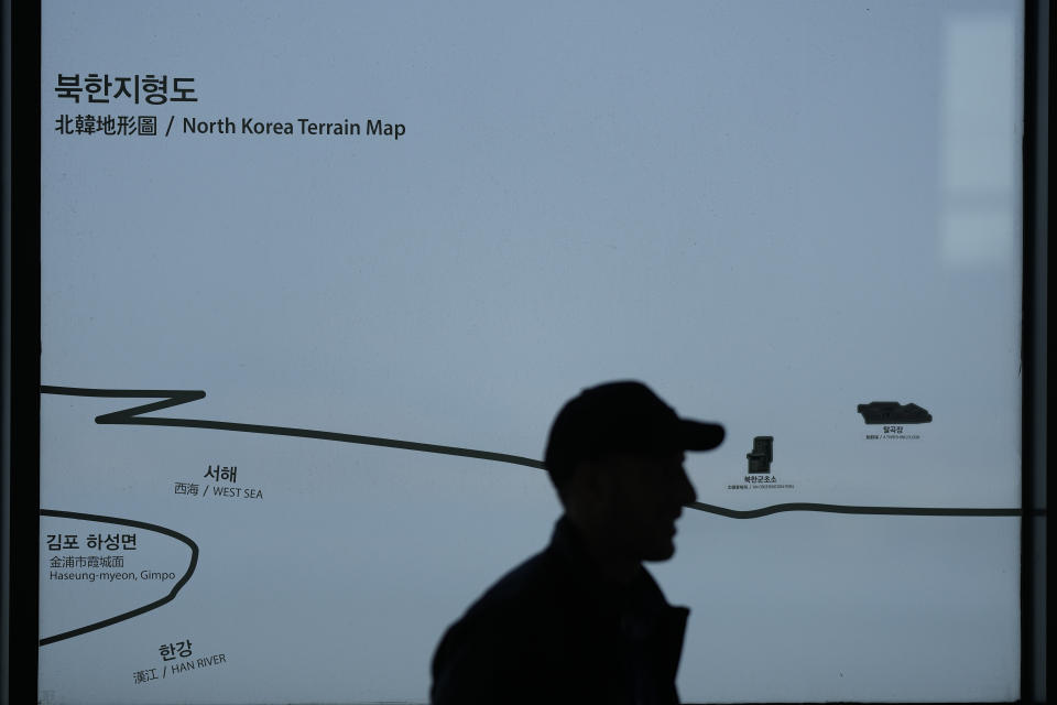 A sign of North Korea is seen at the unification observatory in Paju, South Korea, Wednesday, April 19, 2023. North Korean leader Kim Jong Un said his country has completed the development of its first military spy satellite and ordered officials to go ahead with its launch as planned, state media reported Wednesday. (AP Photo/Lee Jin-man)