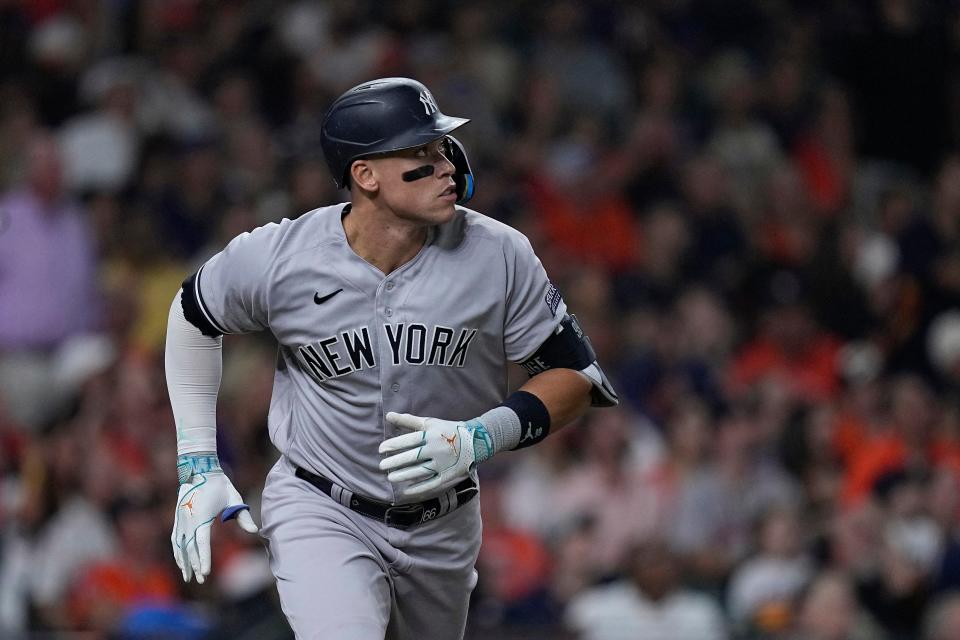 New York Yankees' Aaron Judge watches his solo home run against the Houston Astros during the fifth inning of a baseball game Friday, Sept. 1, 2023, in Houston. (AP Photo/Kevin M. Cox)