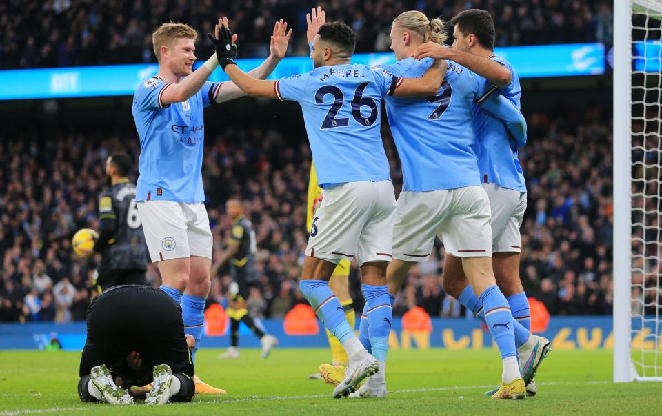 Riyad Mahrez of Manchester City celebrates with team mates after scoring - Getty Images/Matt McNulty