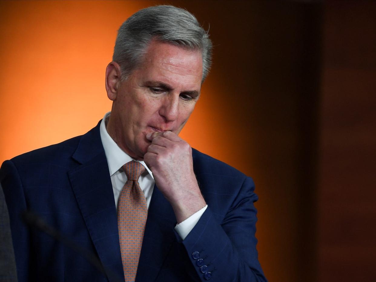 US House Minority Leader Kevin McCarthy strokes his chin with his left hand during a news conference about the Save Our Sequoias Act at the U.S. Capitol in Washington, U.S., June 23, 2022.