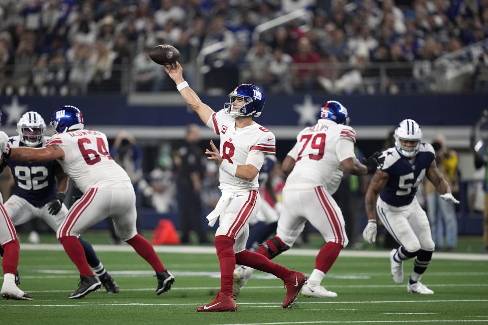 New York Giants quarterback Daniel Jones (8) throws a pass against the Dallas Cowboys during the first half of an NFL football game Thursday, Nov. 24, 2022, in Arlington, Texas. (AP Photo/Tony Gutierrez)