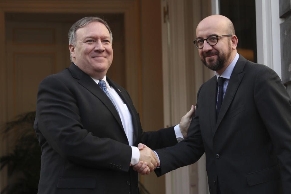 U.S. Secretary of State Mike Pompeo, left, is greeted by Belgian Prime Minister Charles Michel prior to a meeting in Brussels, Tuesday, Dec. 4, 2018. U.S. Secretary of State Mike Pompeo is in Brussels to attend a two-day meeting of NATO foreign ministers. (AP Photo/Francisco Seco, Pool)