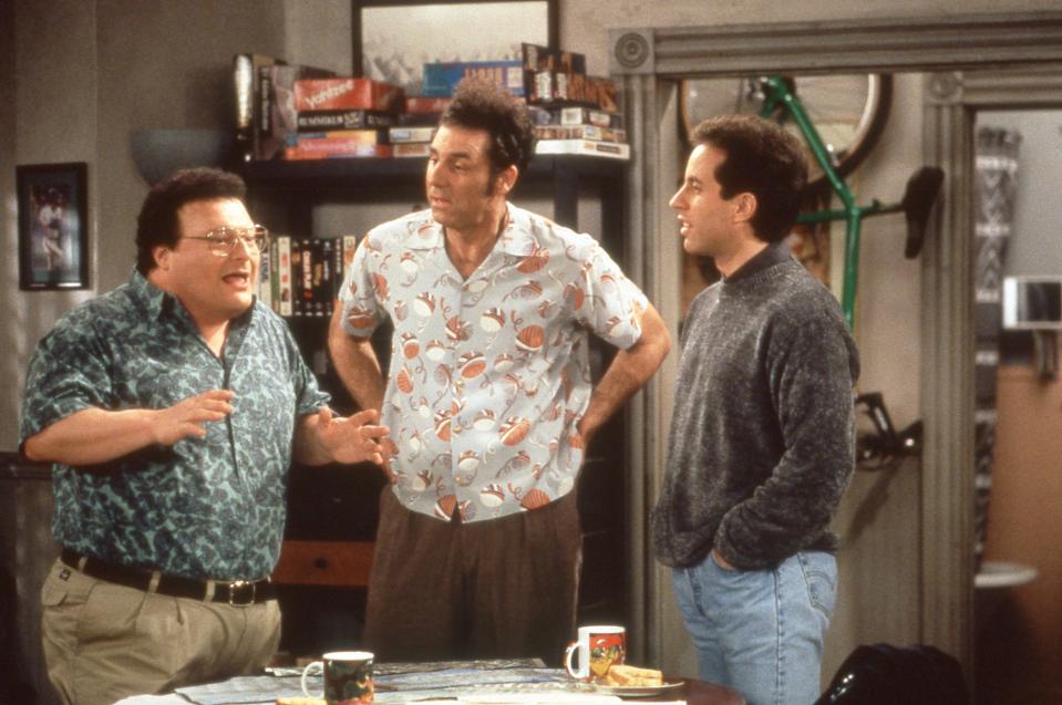 Newman talks to Seinfeld and Kramer