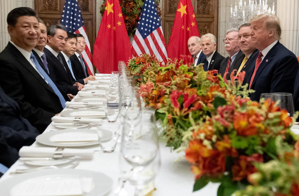 Presidents Trump and Xi, with their delegations, at dinner in Buenos Aries on Dec. 1. Photo: Getty Images