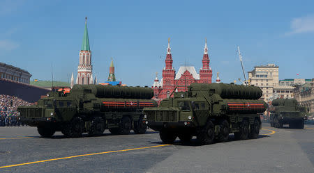 Russian servicemen drive S-400 missile air defence systems during the Victory Day parade, marking the 73rd anniversary of the victory over Nazi Germany in World War Two, at Red Square in Moscow, Russia May 9, 2018. REUTERS/Sergei Karpukhin/Files