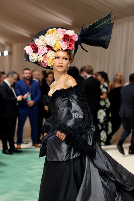 <p>Photo by Dimitrios Kambouris/Getty Images for The Met Museum/Vogue</p><p>In her second look of the night, Zendaya wore a whole bouquet of roses on her head. Because she can. </p>