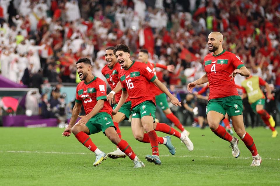 Morocco players celebrates after victory over Spain in a penalty shoot-out (Getty)