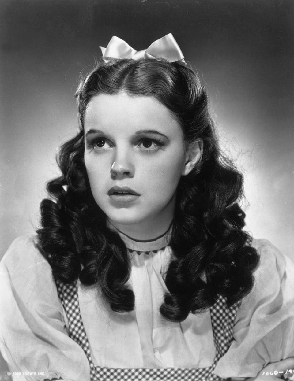 Judy Garland dressed as Dorothy from The Wizard of Oz