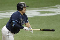 Tampa Bay Rays' Ji-Man Choi, of South Korea, connects for an RBI double off New York Yankees starting pitcher Gerrit Cole during the fifth inning of the first game of a doubleheader baseball game Saturday, Aug. 8, 2020, in St. Petersburg, Fla. Rays' Mike Zunino scored. (AP Photo/Chris O'Meara)