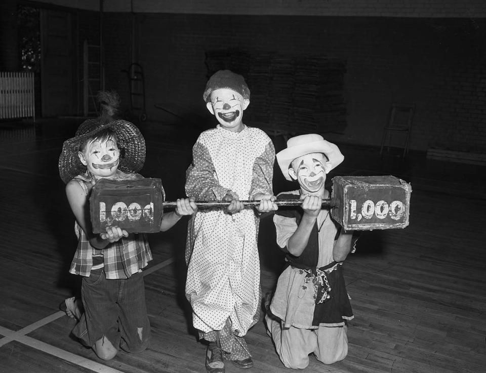 July 30, 1953: One thousand pounds is a lot of weight but the clowns in the recreation department circus prove here they can handle anything. These clowns, of the many in the circus cast, are Mike Hickey, Kenneth Allow and Joseph Turner. The show, open to the public, was held at LaGrave Field.