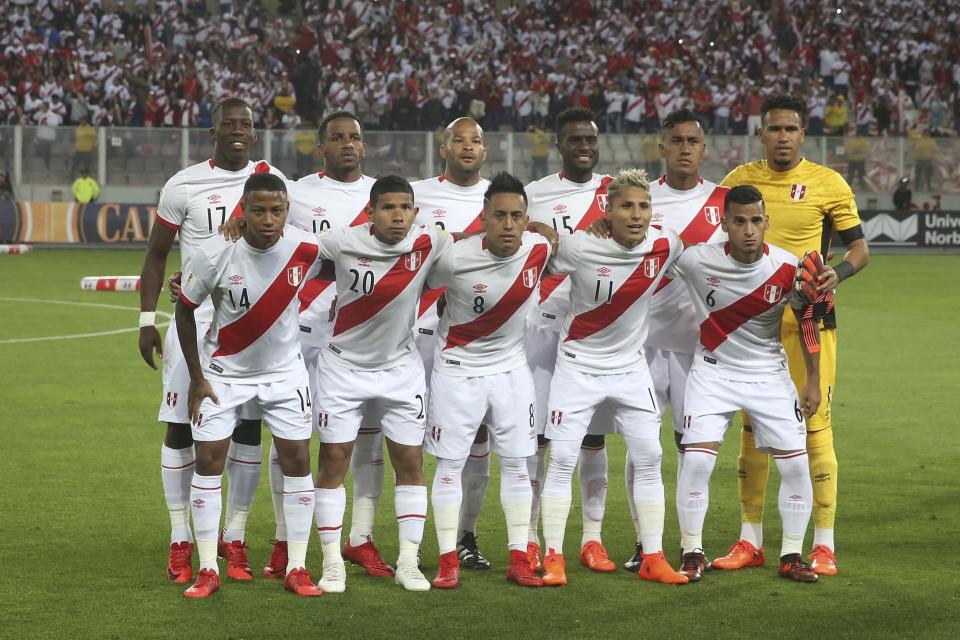 FILE – In this Wednesday, Nov. 15, 2017 filer Peru team poses for a photo prior to a World Cup play-off qualifying match against New Zealand in Lima, Peru. (AP Photo/Karel Navarro, File)