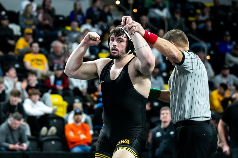 Iowa's Tony Cassioppi has his hand raised after scoring a fall at 285 pounds during the Soldier Salute college wrestling tournament last month.