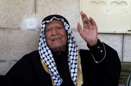 Palestinian man Abdel Fatah Shijaiya, 96, gestures at his house near Ramallah in the occupied West Bank June 21, 2018. Picture taken June 21, 2018. REUTERS/Mohamad Torokman