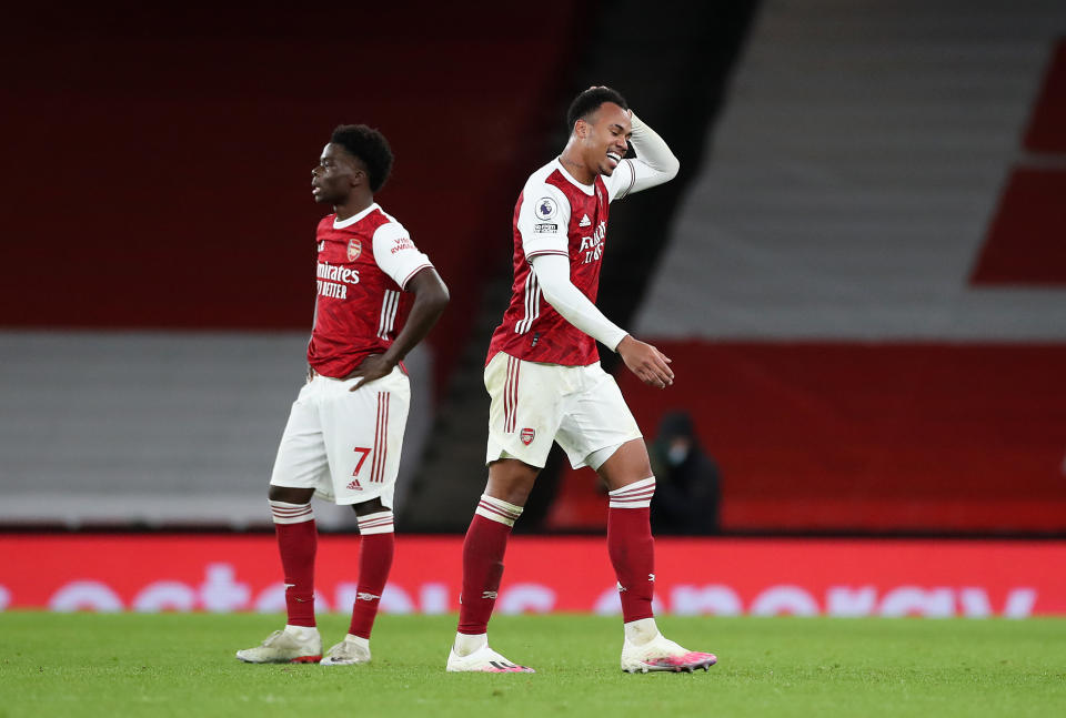 LONDON, ENGLAND - DECEMBER 16: Gabriel of Arsenal reacts as he walks off the pitch after being sent off for a second yellow card during the Premier League match between Arsenal and Southampton at Emirates Stadium on December 16, 2020 in London, England. The match will be played without fans, behind closed doors as a Covid-19 precaution. (Photo by Peter Cziborra - Pool/Getty Images)