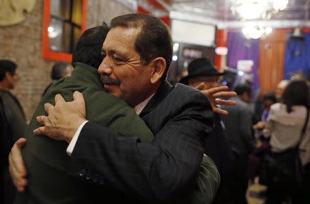 Chicago Mayoral candidate Jesus "Chuy" Garcia hugs a supporter at a rally in Chicago, Illinois, January 15, 2015. REUTERS/Jim Young