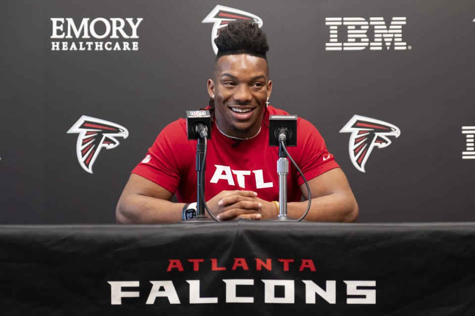 Atlanta Falcons first-round draft pick Bijan Robinson speaks at an NFL football news conference at the team's training facility in Flowery Branch, Ga., Friday, April 28, 2023. (AP Photo/Ben Gray)