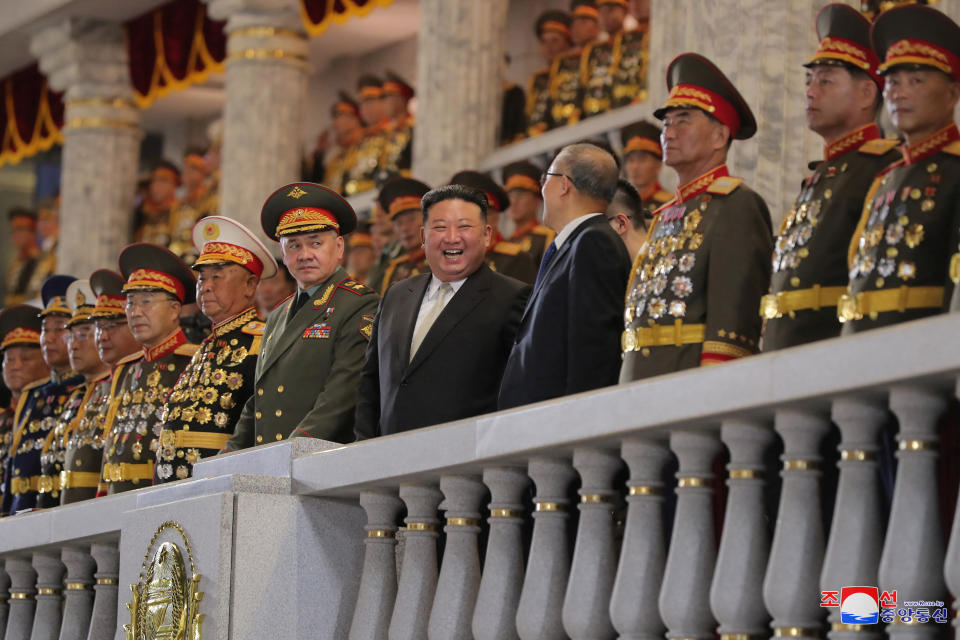 North Korean leader Kim Jong Un, Chinese Communist Party politburo member Li Hongzhong and Russia's Defense Minister Sergei Shoigu pictured at parade.