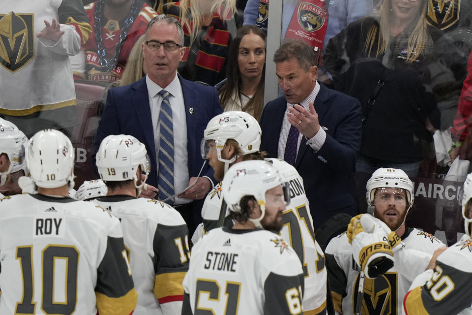 Vegas Golden Knights head coach Bruce Cassidy talks to the team during the third period in Game 4 of the NHL hockey Stanley Cup Finals against the Florida Panthers, Saturday, June 10, 2023, in Sunrise, Fla. The Vegas Golden Knights defeated the Florida Panthers 3-2. (AP Photo/Wilfredo Lee)