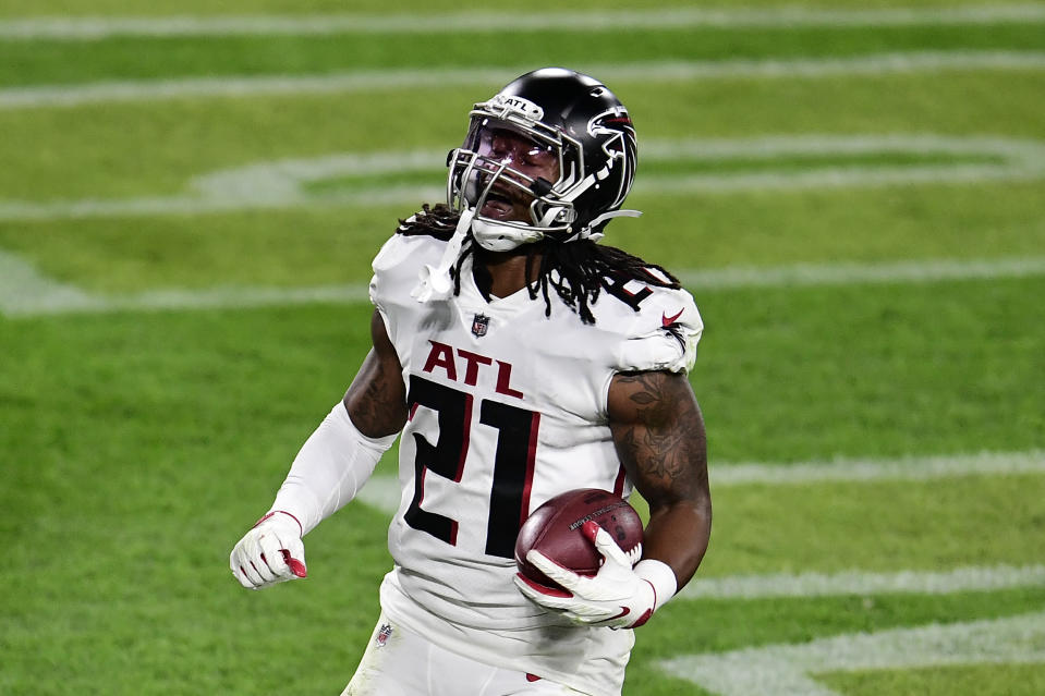 GREEN BAY, WISCONSIN - OCTOBER 05: Todd Gurley II #21 of the Atlanta Falcons celebrates scoring a touchdown during the third quarter against the Green Bay Packers at Lambeau Field on October 05, 2020 in Green Bay, Wisconsin. (Photo by Stacy Revere/Getty Images)