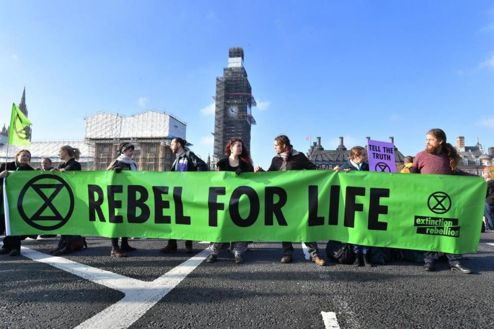 Activists from the Extinction Rebellion group blocked five bridges (PA)