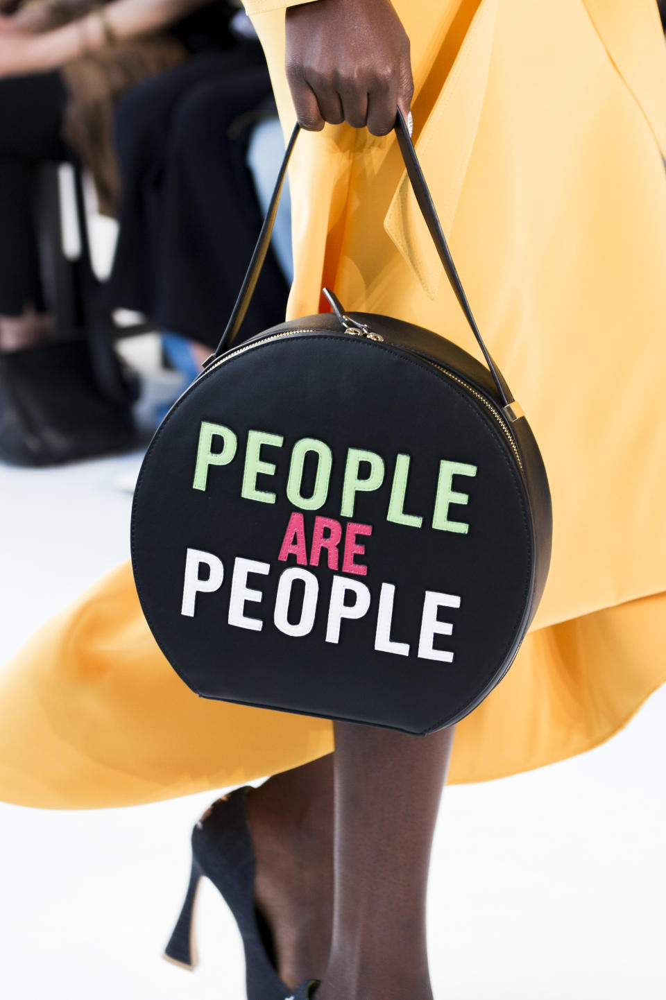 <p><i>“People Are People” circular statement bag from the SS18 Christian Siriano collection. (Photo: ImaxTree) </i></p>