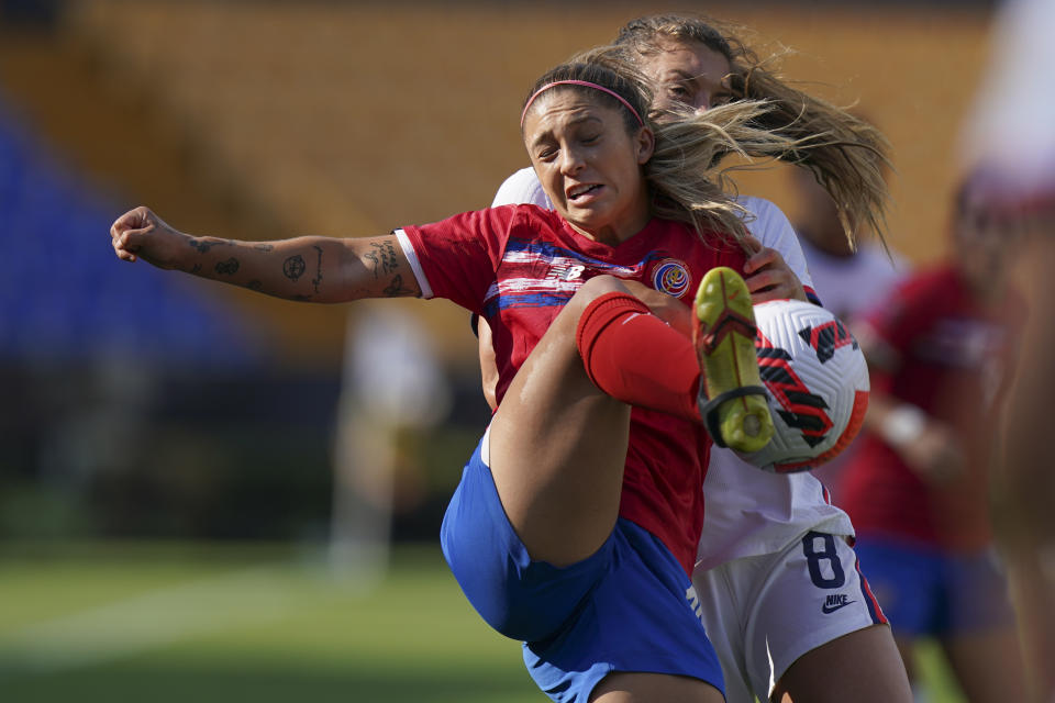 Costa Rica's Priscila Chinchilla, front, and United States' Sofia Huerta fight for the ball during a CONCACAF Women's Championship soccer semifinal match in Monterrey, Mexico, Thursday, July 14, 2022. (AP Photo/Fernando Llano)