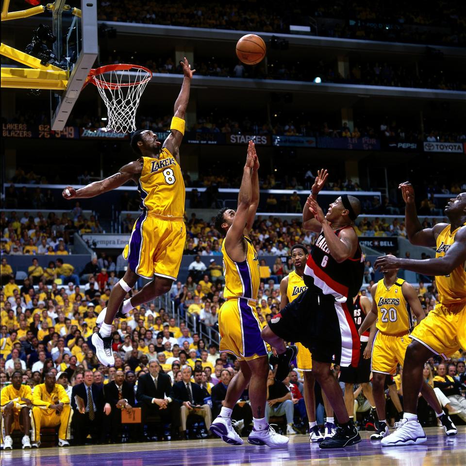 Bryant&nbsp;gets up high to block a shot by Bonzi Wells of the Portland Trail Blazers during a playoff game on&nbsp;June 4, 2000, at the Staples Center in Los Angeles, California.