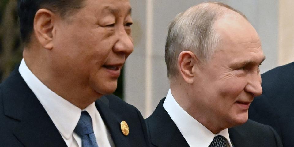 Berichten zufolge schwenken China und Russland auf alternative Kanäle wie Kryptowährung um, um Sanktionen zu umgehen. - Copyright: Grigory Sysoyev/POOL/AFP via Getty Images