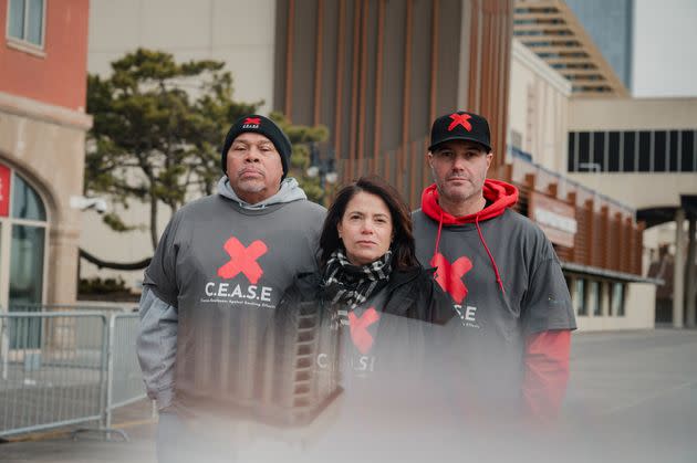 Casino dealers Lamont White, 61, left, Nicole Vitola, 49, and Pete Naccarelli, 46, on the boardwalk in Atlantic City, New Jersey, on Jan. 18. The trio are leading an effort to outlaw smoking in the city's casinos, which have been exempted from a state ban since 2006.