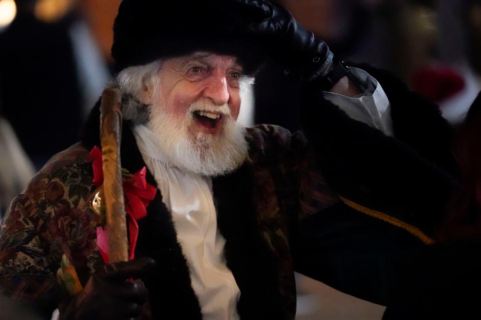 Father Christmas, Santa Claus enjoys the festivities during the Dickens Downtown celebration on Main Ave. in Northport Wednesday, Dec. 5, 2023.