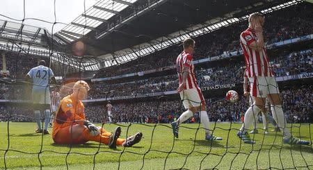 Football Soccer - Manchester City v Stoke City - Barclays Premier League - Etihad Stadium - 23/4/16 Stoke's Jakob Haugaard looks dejected after Kelechi Iheanacho scores the third goal for Manchester City Reuters / Andrew Yates Livepic EDITORIAL USE ONLY. No use with unauthorized audio, video, data, fixture lists, club/league logos or "live" services. Online in-match use limited to 45 images, no video emulation. No use in betting, games or single club/league/player publications. Please contact your account representative for further details.