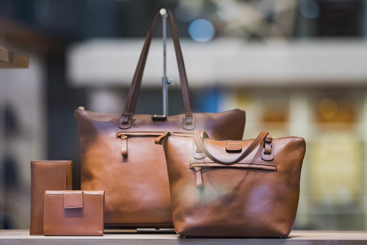 Women luxury handbags in a store in Milan