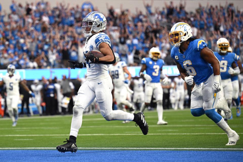 Detroit Lions receiver Amon-Ra St. Brown celebrates after scoring a touchdown against the Los Angeles Chargers during the second half at SoFi Stadium on Nov. 12, 2023 in Inglewood, California.