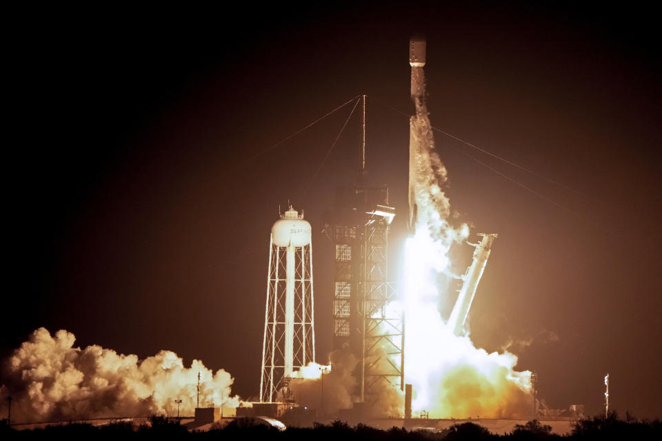 A SpaceX Falcon 9 rocket lifts off from pad 39A at Kennedy Space Center in Cape Canaveral, Fla., early Thursday, Feb. 15, 2024. If all goes well, a touchdown attempt on the moon by Intuitive Machines' lunar lander would occur Feb. 22, after a day in lunar orbit. (AP Photo/John Raoux)