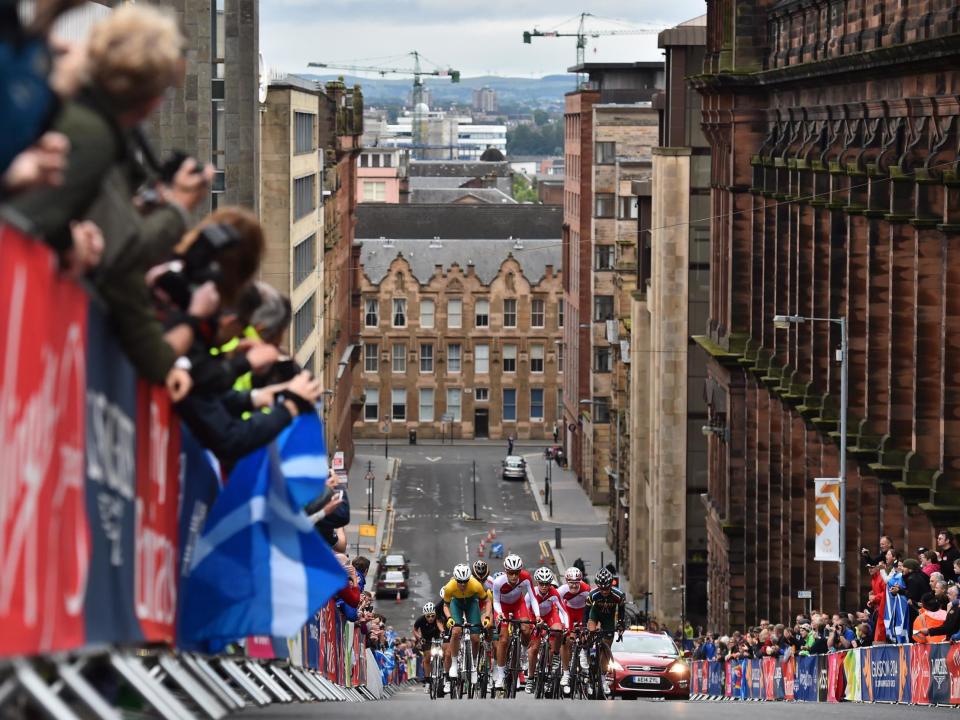 On an August morning later this summer, some of the best cyclists in the world will roll across the Tay Road Bridge between Dundee and Fife clad in nothing but plastic bottles. Six, to be precise, the number needed to create the world’s most environmentally friendly jerseys for a groundbreaking bike race. The jerseys, designed by sportswear brand Scimitar, are just one of the many unusual aspects of the new UCI European Tour race called the Women’s Tour of Scotland, which organisers have promised will be the world’s first climate-positive sports event by the time its second edition comes around in 2020. They have drawn up ambitious plans to aggressively cut emissions and nullify their impact on the planet, aiming for zero waste to landfill, recycling and reusing plastic bottles on the road and discouraging suppliers from using diesel generators. Every detail will be monitored, recorded and reduced each year. This will be no easy task. Around 2% of total UK greenhouse gas emissions come from live events, with music and sport the biggest contributors. While the cyclists themselves are spreading the gospel on two wheels, the anticipated 100,000 spectators over the three-day stage race will leave behind a heavy footprint.An experienced team has been assembled to direct the project. Their biggest challenge has not been costs or technology, but convincing suppliers and partners to buy in to the plans, and perhaps this is where they have felt the effects of a broader societal shift, a kind of cultural guilt-trip that has every stakeholder wanting to be seen playing its part.“We’re getting that buy-in so far from suppliers, this is something they want to do,” says Luke Howell, who brings experience working on other major events, including Glastonbury Festival. “It shows the times are changing. More and more of our brands organisations are engaged in a way they haven’t been before. “It’s big news now, consumers are more aware, businesses are more aware, and people actually want to be seen doing something about it.”The race aims to break ground in other ways, too. It is the first UCI stage race to begin life as a women’s event, and will pay its riders exactly the same prize money as a men’s equivalent. And the hope is, that along with the UCI World Championships coming to Scotland in 2023, they can lure more Scots on to bikes in day-to-day life.“From a Scottish perspective, it’s a big national priority in terms of moving towards a low-carbon economy,” says Esther O’Callaghan, the race’s head of legacy and development. “Cyclists tend to be more environmentally friendly, so we’re hoping to galvanise people by that.”There are numerous other events in cycling and wider sport making significant steps to cut emissions and minimise their mark on the planet, but retrofitting is hard; from a standing start, the Tour of Scotland hopes to achieve something unique – “a wholesale approach: production, race, spectators, suppliers, everything,” says O’Callaghan – and in the process, set a new bar for others to aim at.“What we’re doing can certainly be replicated around other events,” says Howell. “Once we’ve shown we can do it on this event, there’s no reason why it can’t be done elsewhere.” * Changing the Game: Introducing our new series * Part I: 'Build-everything Games are over': The Olympic host is evolving * Part II: From St Andrews to Trump, the golf courses gasping for breath * Part III: Katie Ormerod interview: Shrinking my carbon footprint